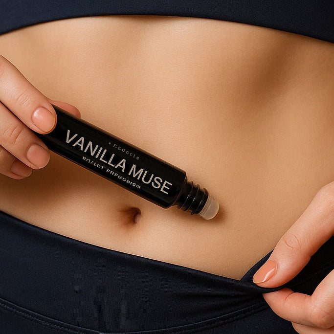 Woman applying Viamax perfume oil roll-on fragrance 10ml